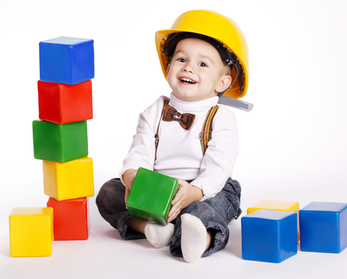 boy playing with blocks